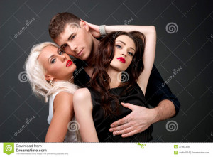 embraces. A loving relationship between a men and two women. Love ...
