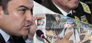 Jose Serrano showing pictures of the gunman escorting Jimenez
