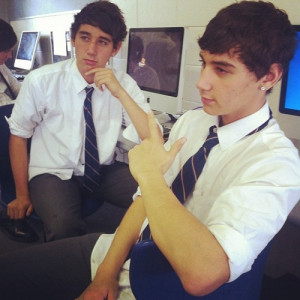 Left to right: Luke Brooks and Jai Brooks learning new poses.)