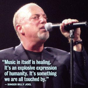 ... of Billy Joel performing live, with an accompanying inspiring quote