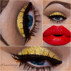 Gold eyeshadow, winged liner, and bold red lips.
