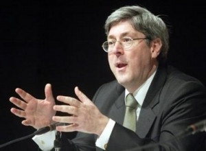Douglas Feith speaks during a news conference at the American center