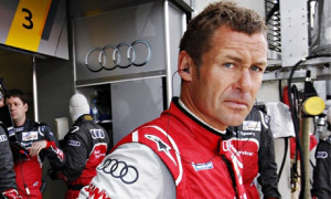 Tom Kristensen at the pit near his Audi R18 TDI just before the Le