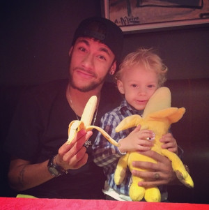 Neymar poses with little Neymar, attitude and all.