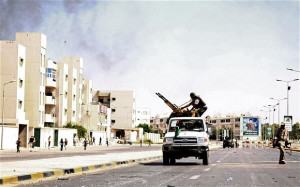 NATO must soon withdraw from Libya; Libyan rebels battle loyalists in ...