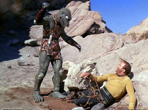 Captain Kirk ensnared in a clever trap by the man in a rubber lizard ...