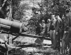 General Dwight D. Eisenhower, in Normandy with troops and a mighty ...