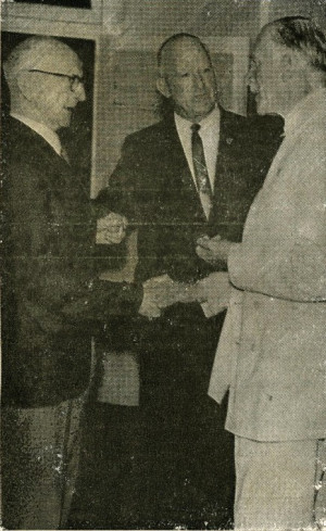 Thomas left being presented to the Governor of Queensland Sir Henry