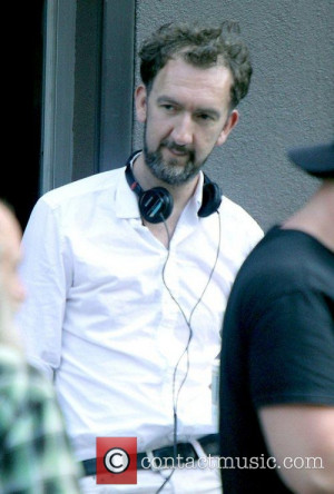 director john carney filming on the set 3973493