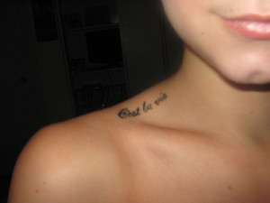 My third tattoo on my shoulder, C'est la vie is french for That's life