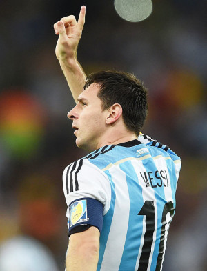 Lionel Messi of Argentina acknowledges the fans after defeating Bosnia
