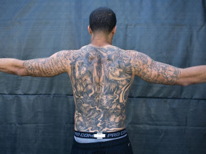 ... his many tattoos at the team's practice facility in San Carlos, Calif
