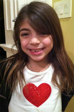 Milania Giudice Milania lost her first tooth!