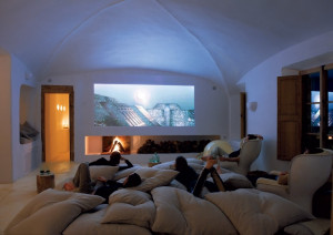 The dome-shaped ceiling opens up this media room basement . The ...