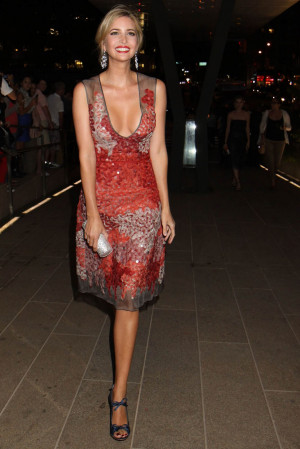 Her smile makes this photo for me, plus the low cut adds major sex ...