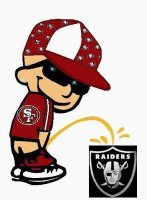 ... Calvin is peeing on the Raider's shield while wearing his 49er gear