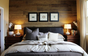 Love the wood accent wall perfect backdrop to frame the bed and
