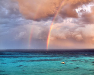 Double rainbow during a stormy Cancun afternoon. “Dare to love ...