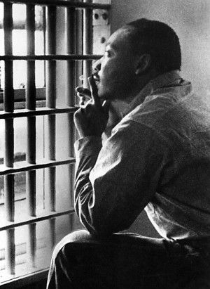 Martin Luther King, Jr., sitting in the Jefferson County Jail, in ...