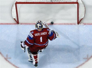 Russia's goalie Semyon Varlamov reacts after conceeding a goal to ...