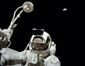 Apollo 17 astronaut Harrison Schmitt looks toward the camera by the ...