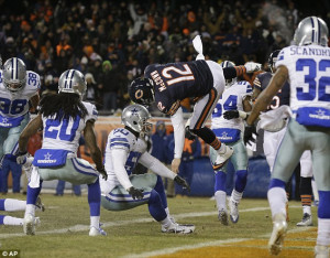 Up high: Chicago Bears quarterback Josh McCown dives into the end zone ...