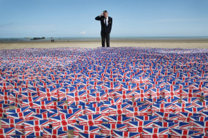 WW2 veteran Fred Holborn, from the Fleet Air Arm, salutes as he looks ...
