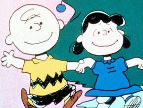 Lucy and Charlie Brown are shown during Christmastime.