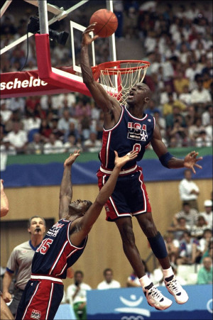 Michael Jordan soars above teammate Magic Johnson at the 1992 ...