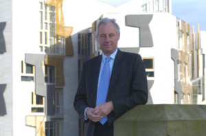 Tim Yeo pictured outside the Scottish Parliament says he is