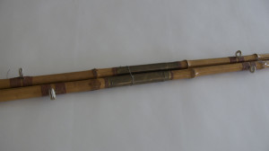 pair of vintage bamboo fishing poles image 2