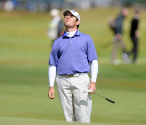 Oosthuizen reacts after a putt on the second day of the Open ...