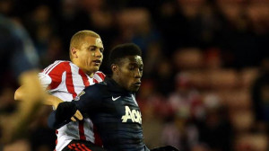 Sunderland's Wes Brown, left, vies for the ball with Manchester United ...