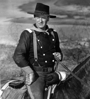John Wayne On Horse John wayne is shown during the