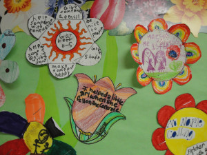 Students decorated the flower templates using crayons and markers.