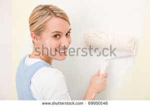 stock-photo-home-improvement-handy-woman-painting-wall-with-roller ...