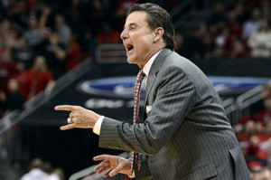coach Rick Pitino instructs his team during a NCAA college basketball ...