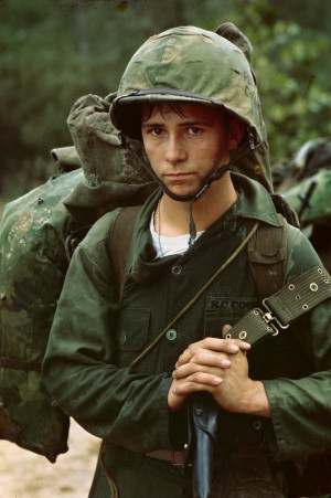 Da Nang, Vietnam...A young Marine private waits on the beach during ...