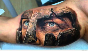 Spartan 3d tattoo on biceps