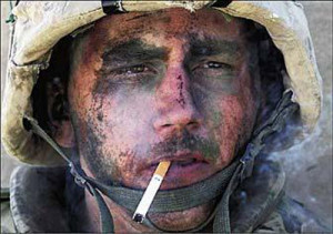 WW2 battle weary soldier with cigarette in his mouth