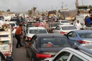 Residents flee Ramadi, 70 miles west of Baghdad, on Thursday. Photo ...