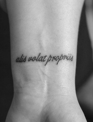 ... more alis volat propriis she flies with her own wings tattoo on wrist