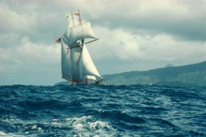 Sailing ship in rough seas, St. Lucia - Greg Pease/Stone/Getty Images