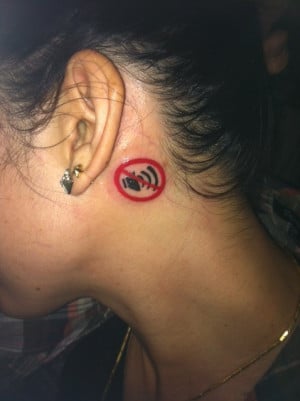 ... here. This young lady has bilateral hearing impairment. Great tattoo