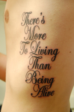 ... There is more to living than being alive quotes tattoo on side body