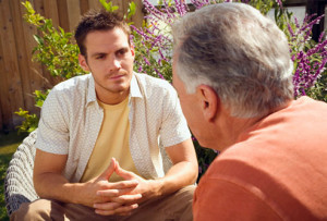 getty_rf_photo_of_adult_son_talking_with_father.jpg
