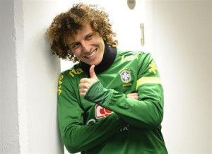 Brazil's football player David Luiz gestures during a news conference ...