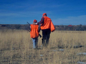 father and son enjoying a day of hunting.