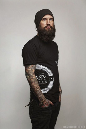 beaded man | Bearded tattooed man