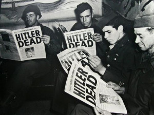 Servicemen read of Hitler's death [April 1945]